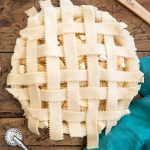 woven pie crust strips over apple pie