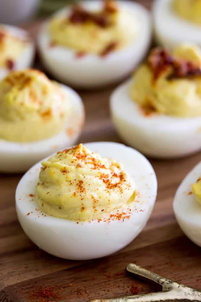 Deviled eggs topped with paprika