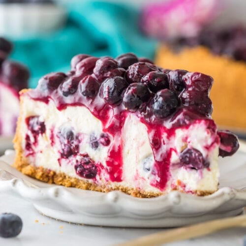 slice of blueberry cheesecake topped with blueberry topping