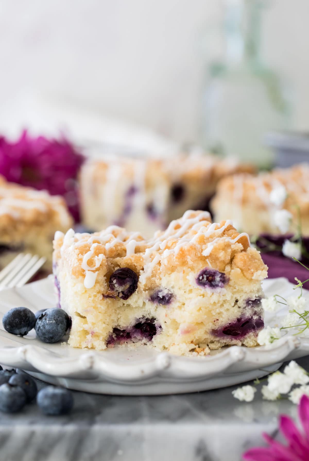 blueberry cake with bite out of it