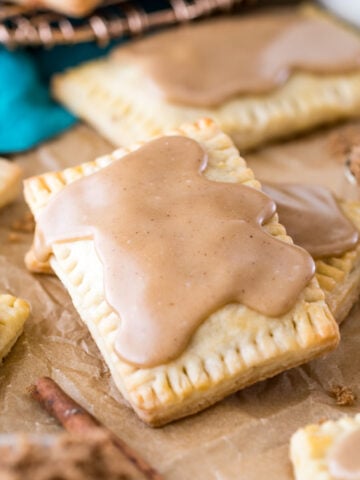 two brown sugar pop tarts with one resting on top of the other