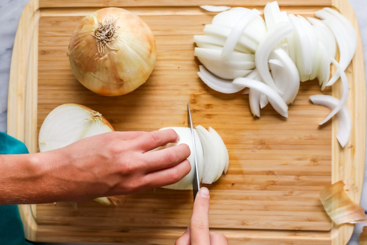 photograph showing how to slice onions for caramelizing