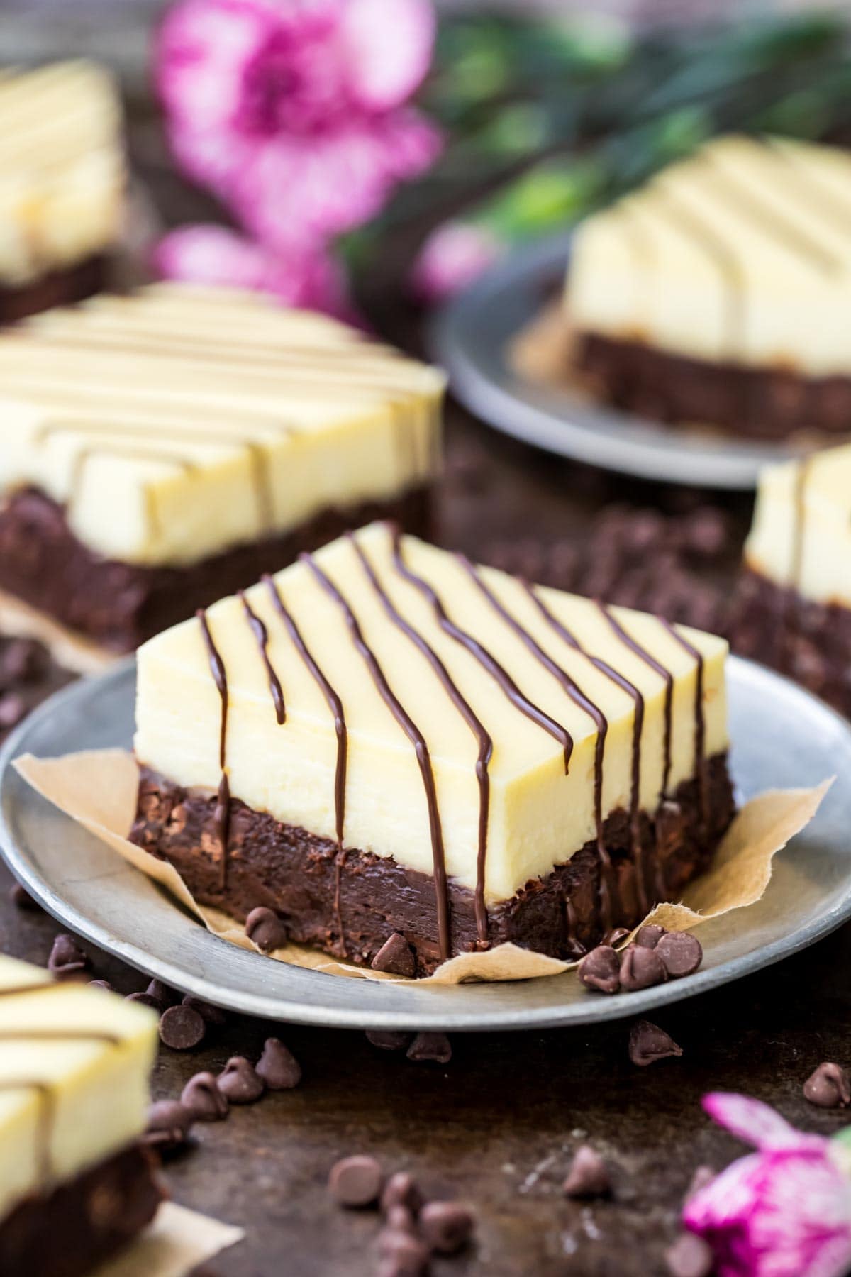 Cheesecake brownie on a gray plate.