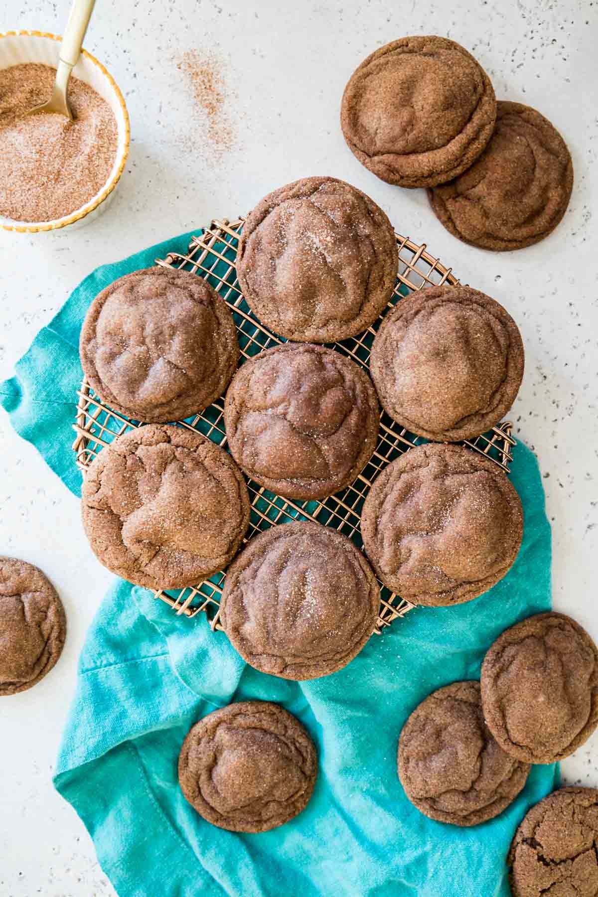 Overhead view of chocolate snickerdoodle cookies on a cooling rack.