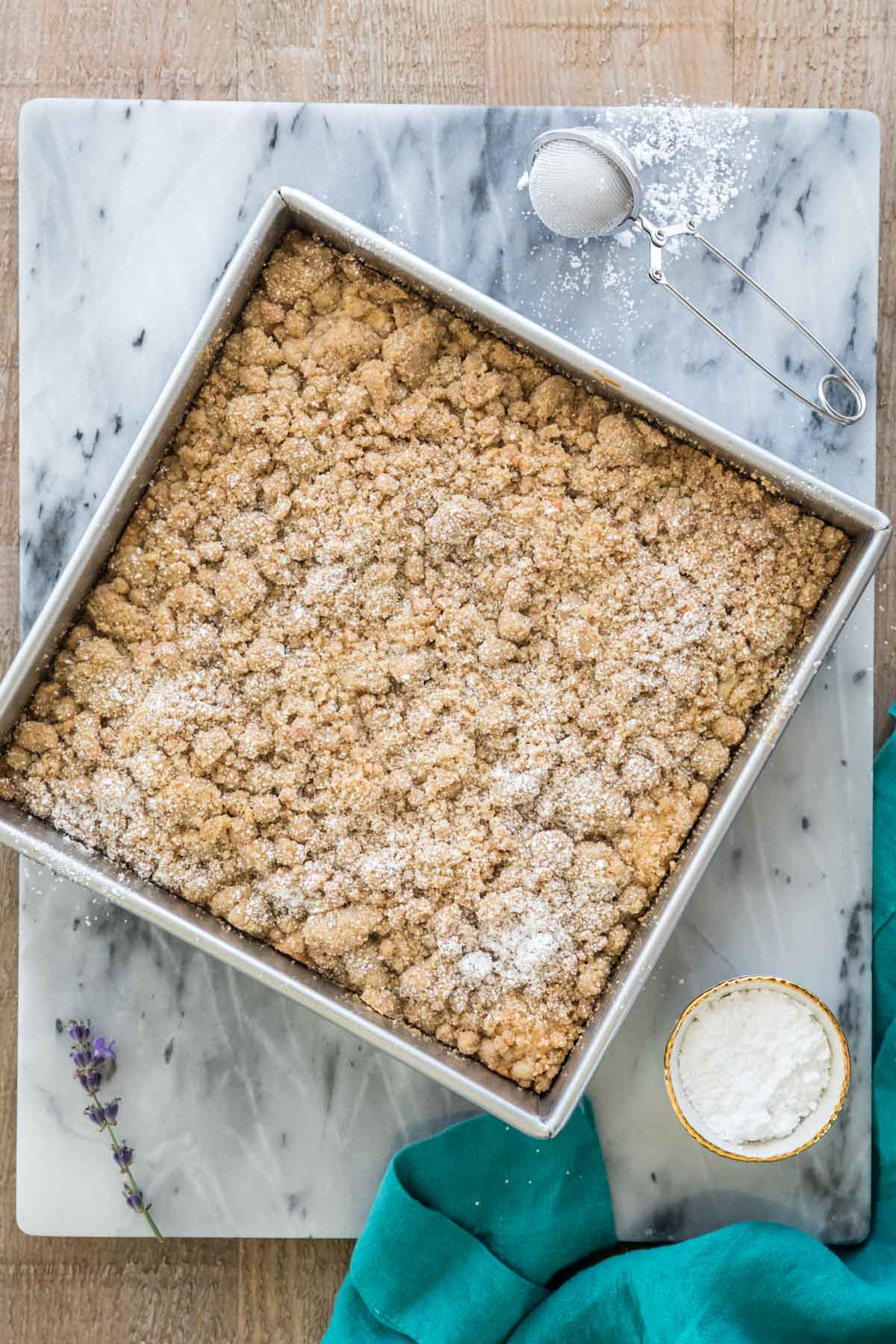 Overhead photo of crumb cake in metal pan