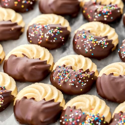 cookies dipped in chocolate on marble surface