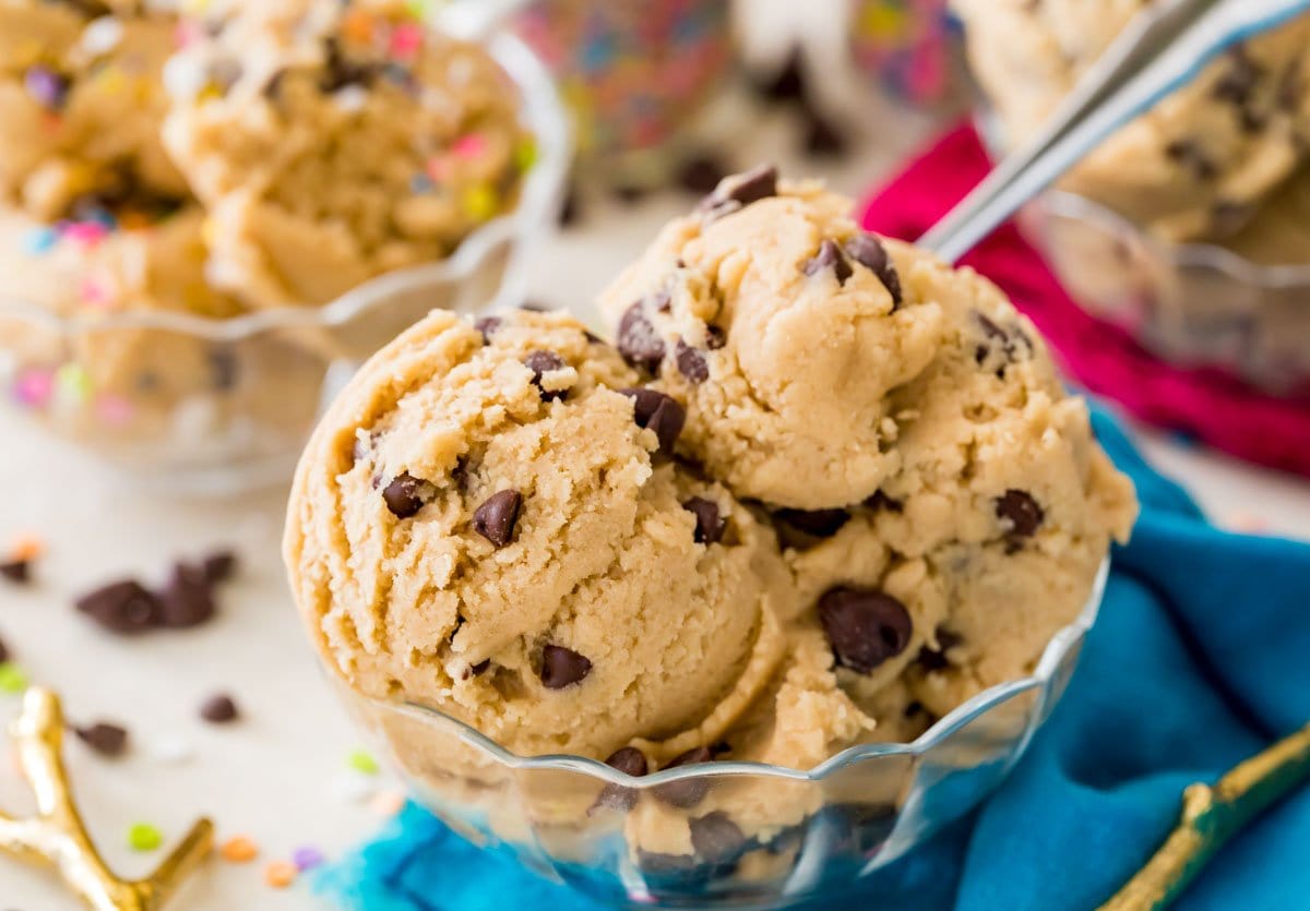 scoops of chocolate chip cookie dough in a clear bowl