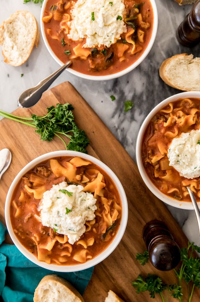 Overhead of lasagna soup with ricotta topping