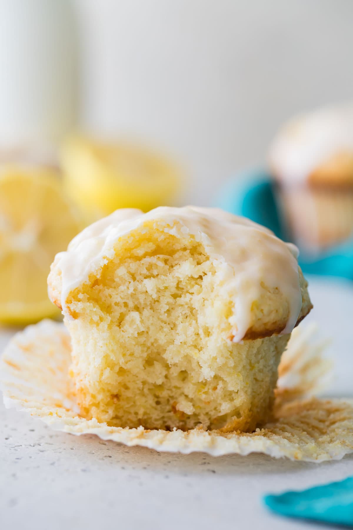 glazed muffin that's been unwrapped and bitten into