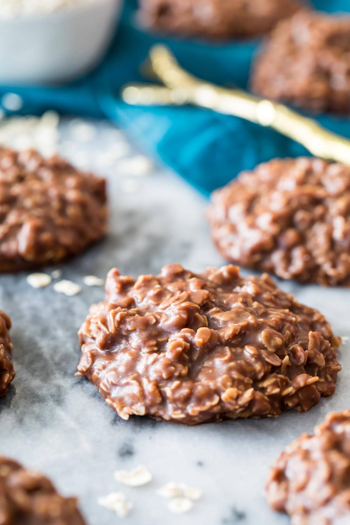 round, chocolatey no-bake cookies resting on a marble surface