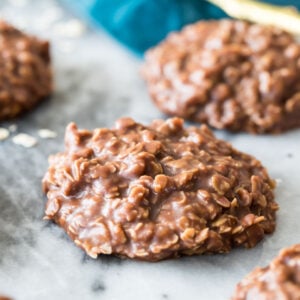 two no-bake cookies resting on a marble surface