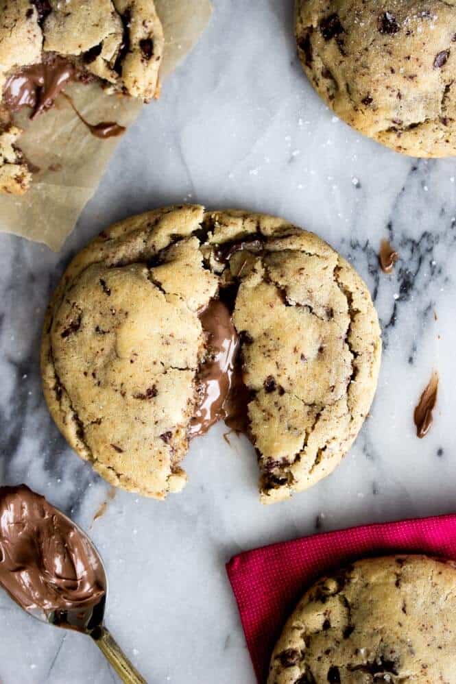 Nutella Stuffed Cookies - made with brown butter and sprinkled with sea salt! || Sugar Spun Run