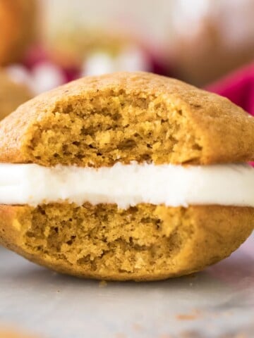 pumpkin whoopie pie with bite missing