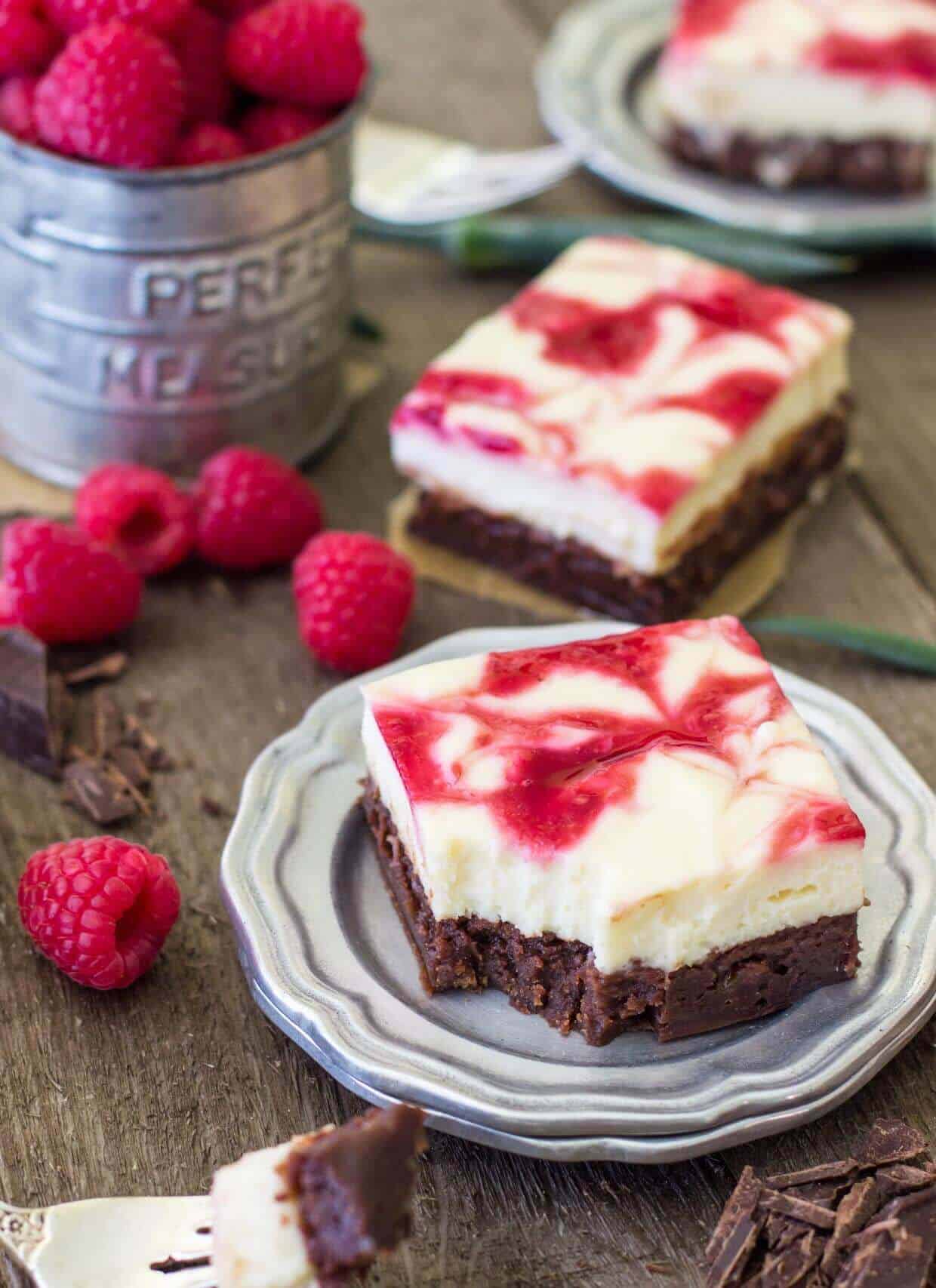 Raspberry Cheesecake Brownies on metal plate