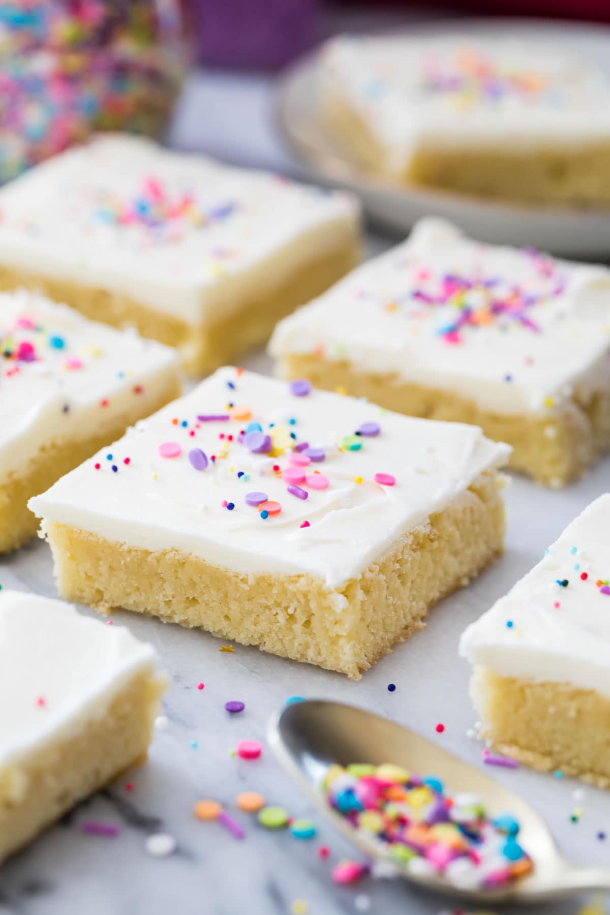 neatly cut frosted sugar cookie bars arranged in rows